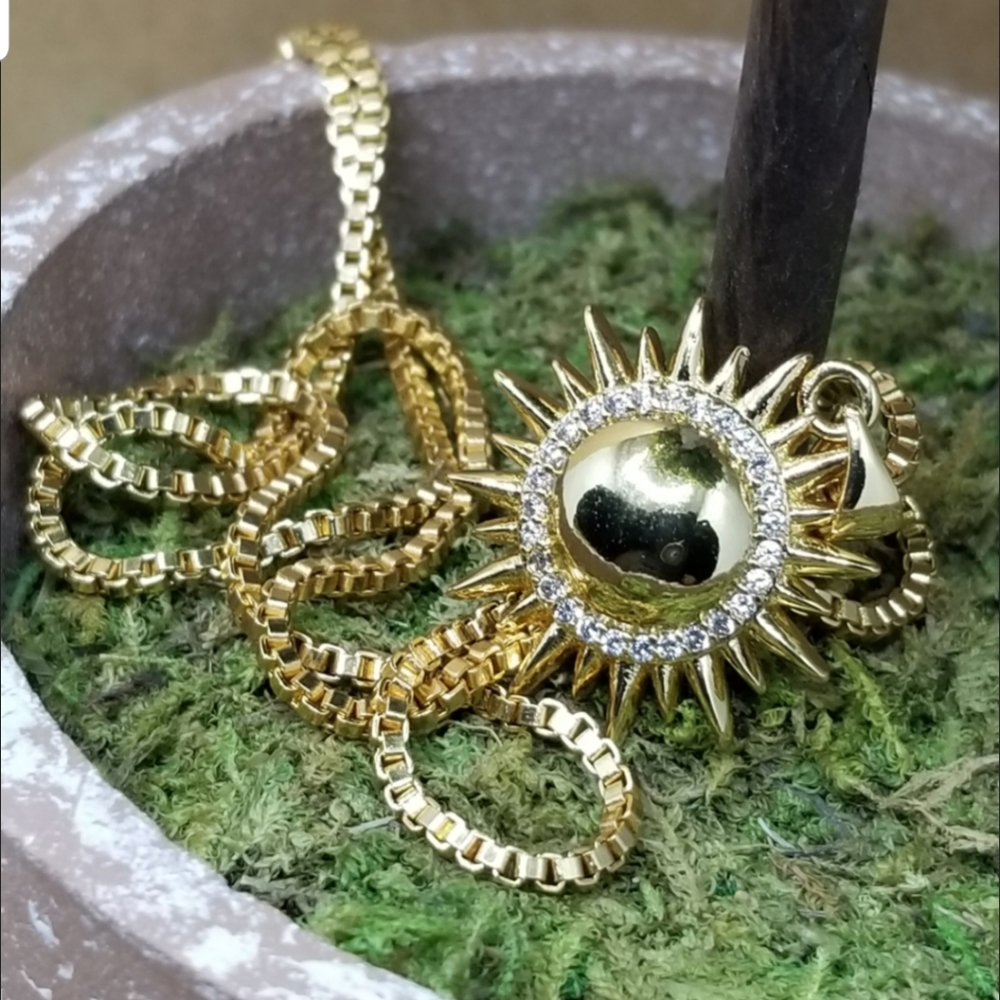 Gold sunburst necklace